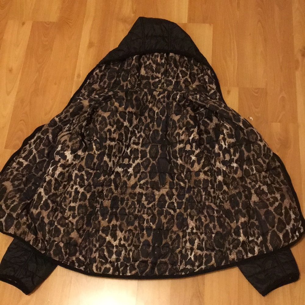 Black thin puffer jacket.